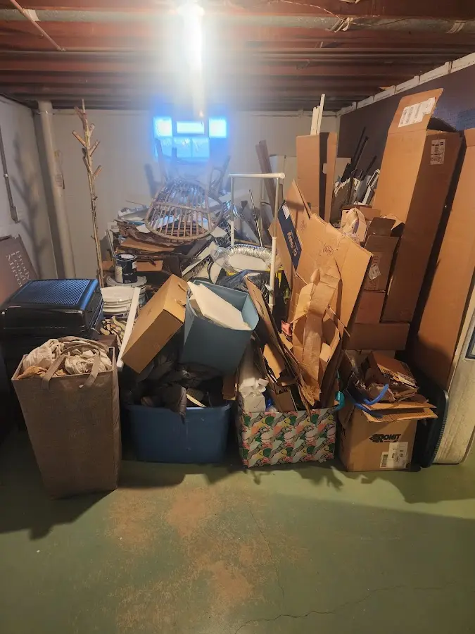 Roll-off dumpster container at job site for 2 Yard Dumpster Rental in Tyrone